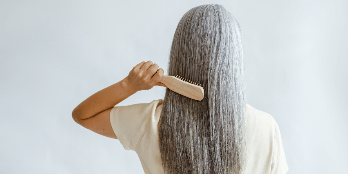 brushing grey hair