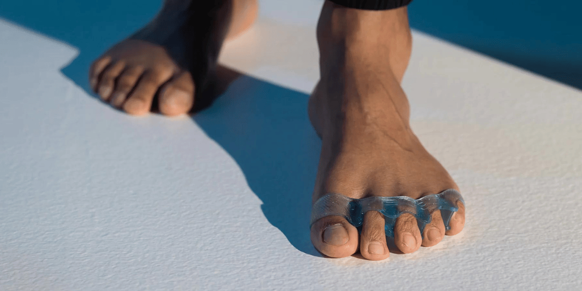 feet wearing toe spacers